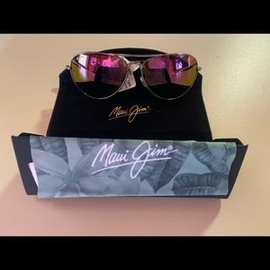 Brand new Maui Jim’s never used. Rose gold lenses